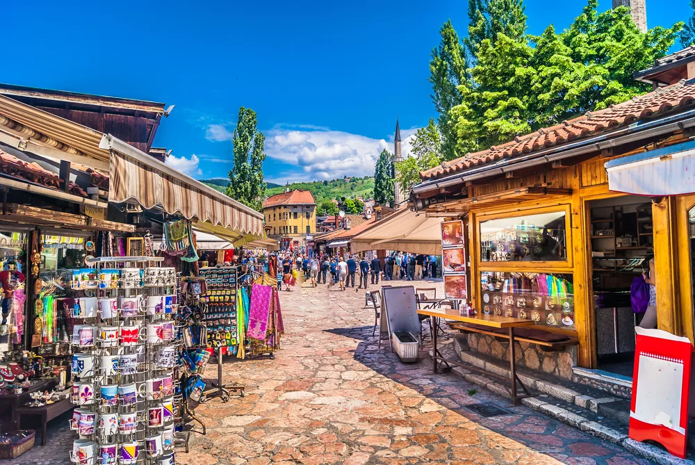 Photo of an open-air market on Bascarsija Street in Sarajevo pictured for a piece titled is Bosnia Safe to Visit