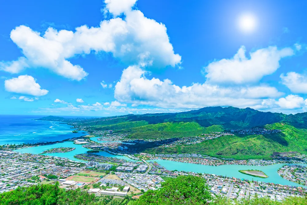 Hawaii Kai aerial view with blue skies and clouds overhead in Honolulu County during the best time to visit Honolulu