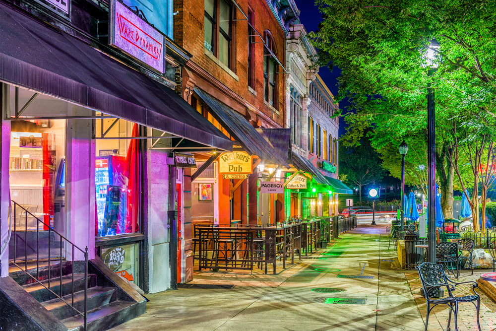Little shops and bars along the main street in Athens, a top pick for the best places to visit in Georgia, seen at night