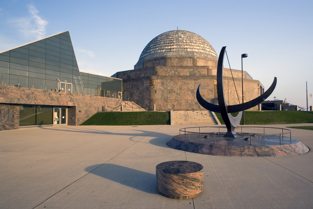 Sculpture outside of the Adler Planetarium, one of Chicago's best places to visit, seen on a clear summer day