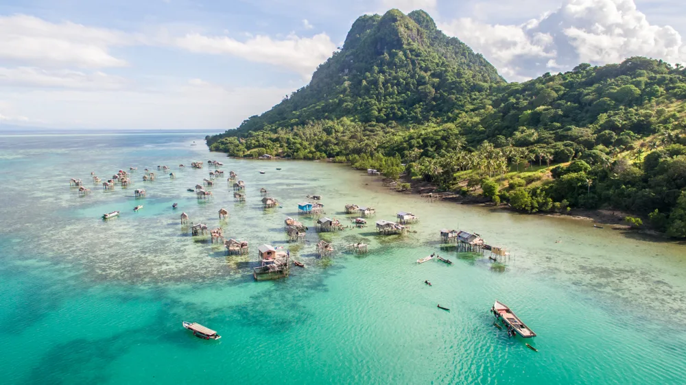 Gorgeous aerial view of the sea gypsy water village in Borneo pictured in Mabul Bodgaya Island