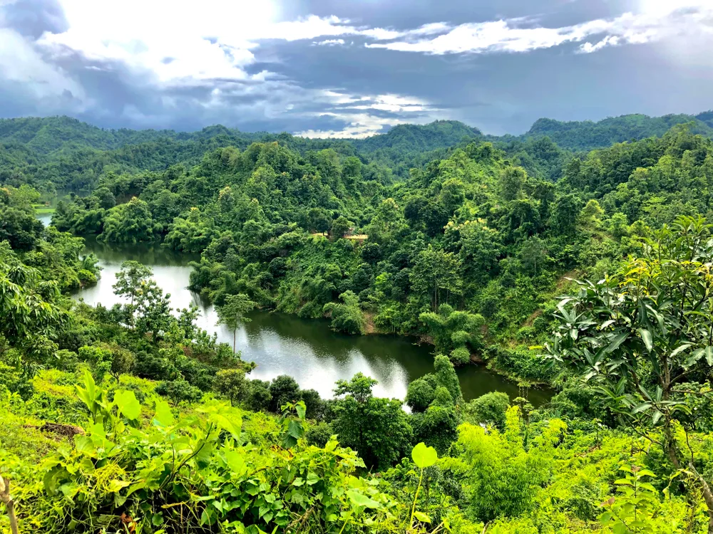 Aerial view of jungle and forest areas with a small lake in Rangamati during the spring, the cheapest time to visit Bangladesh