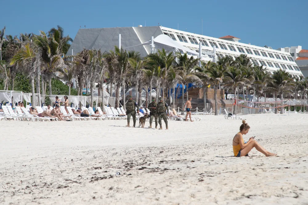 Police shutting down a beach in the Hotel Zone in Cancun for a piece titled Is Riviera Maya Safe to Visit