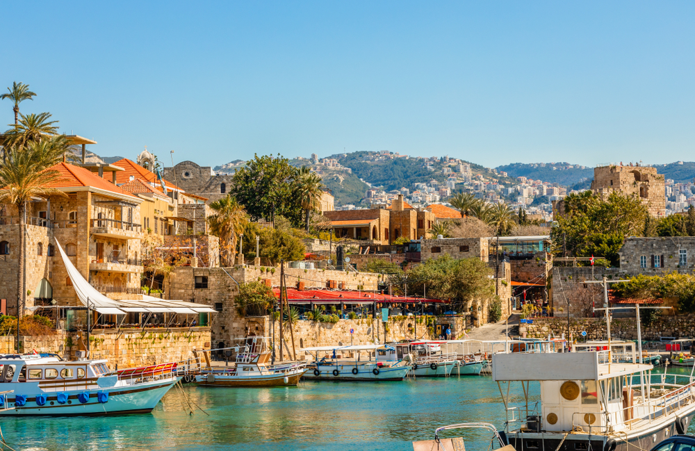 Jbeil fishing port in Byblos with boats docked on a clear day taken during the best time to visit Lebanon