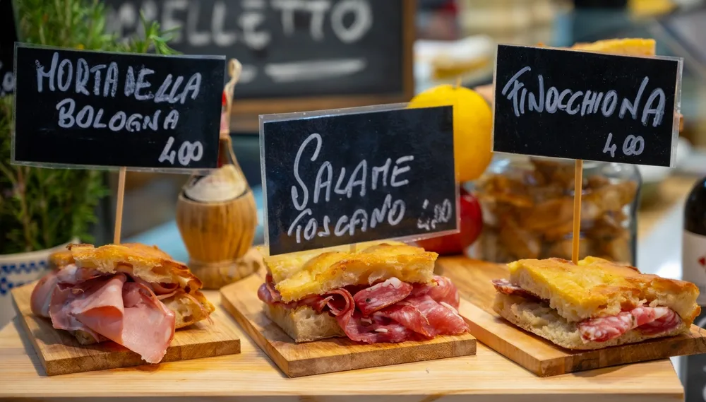 Florentine street food set up with price cards to show what visitors might eat during the best time to visit Florence