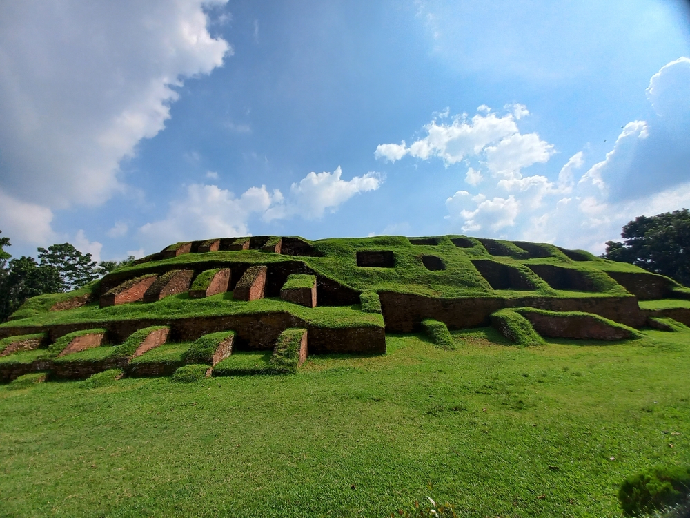 Mahasthangarh, the oldest archeological site in the country, shown from the ground on a pleasant day during the best time to visit Bangladesh