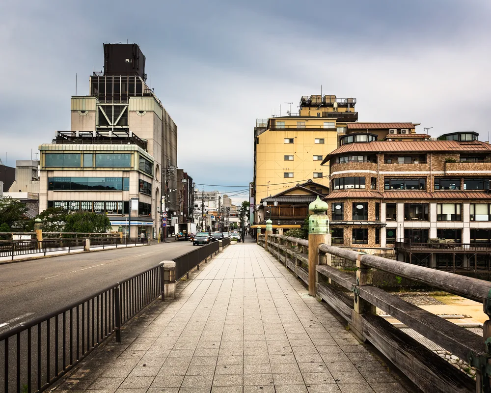 Cloudy and gloomy morning over the Sanjo Ohashi Bridge pictured for a guide to whether Kyoto is safe to visit
