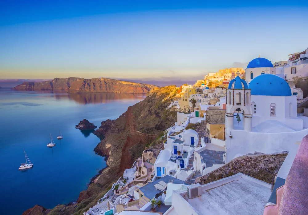Unique blue and white village of Oia in Santorini, one of the best places to stay in Greece