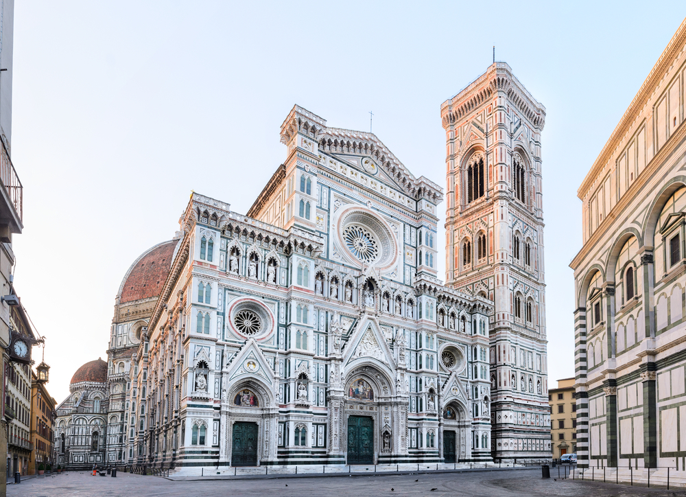 Florence Cathedral or Santa Maria del Fiore seen at sunrise to indicate why you should visit Florence