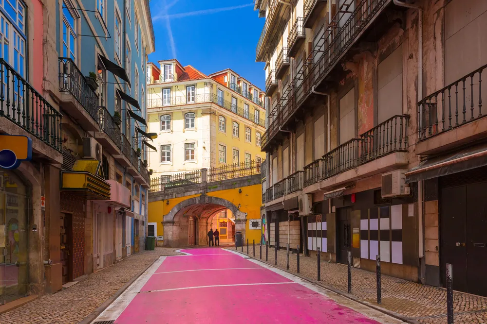 Famous pink streets of Rua Nova do Carvalho in the Cais do Sodre area, one of the best areas to stay when in Lisbon