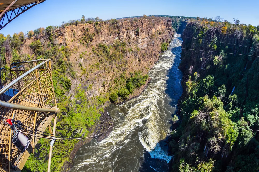 POV of a person about to bungee jump off the Victoria Falls bridge