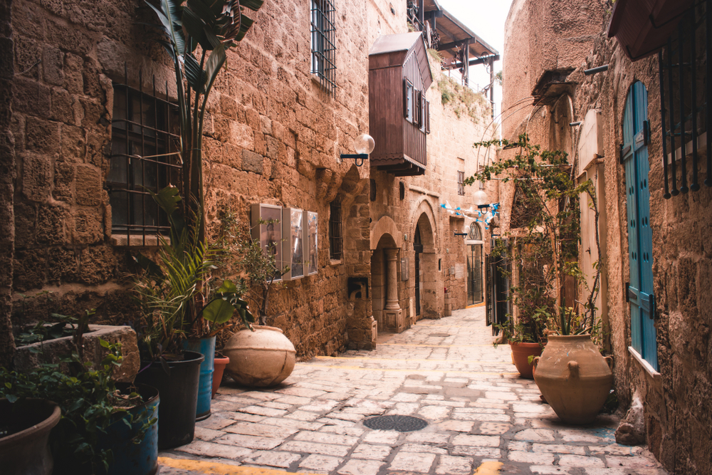 Brick and stone buildings in the alleyway of Jaffa, the old city, pictured during the overall best time to go to Tel Aviv