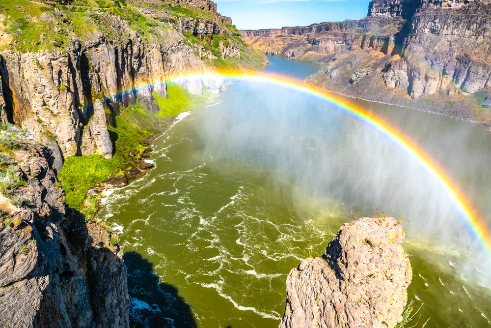 Double rainbow over the falls during the overall best time to visit Shoshone Falls Idaho