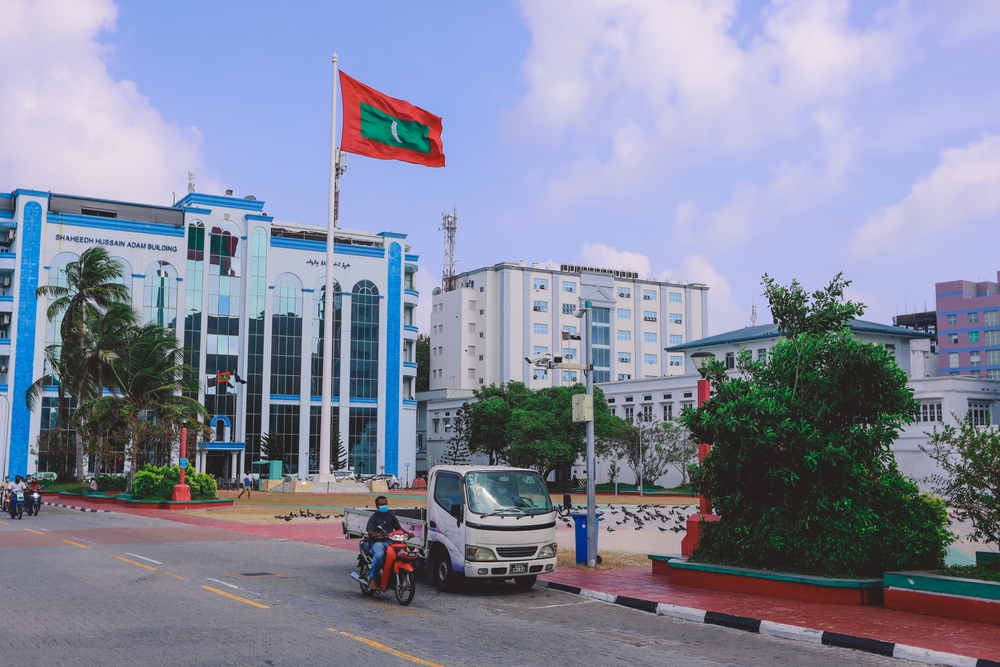 To illustrate that the Maldives are safe to visit, one of the highest crime rate areas, Male, pictured with run-down buildings in the background
