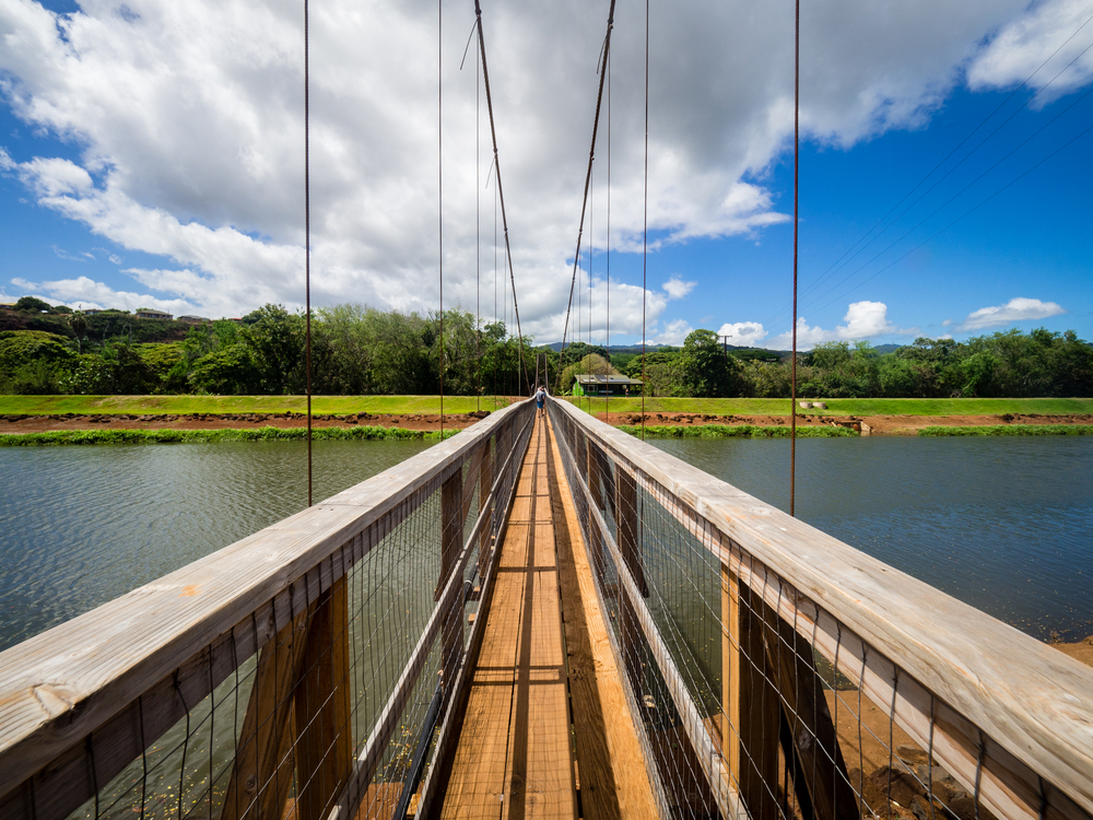 Unique swinging suspension bridge in Hanapepe for a piece on whether or not it's safe to visit Kauai this year