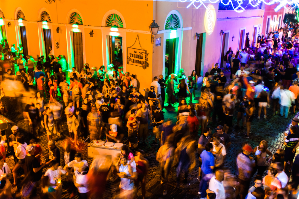 Festival-goers partying and enjoying nightlife in Puerto Rico, where the nightlife is usually better than in the Dominican Republic