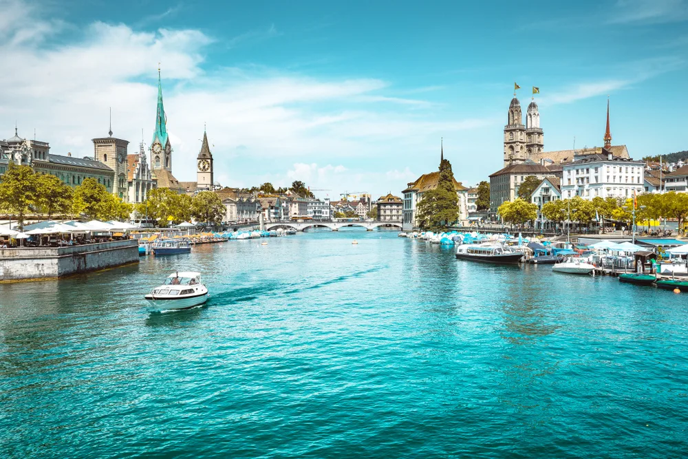 Boats on the water in Zurich during the overall best time to travel there