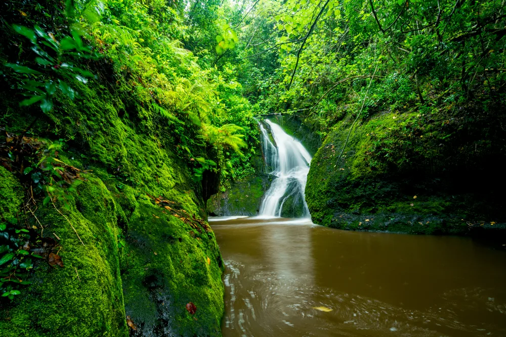 Papau Waterfall on Rarotonga, one of the best places to consider when thinking about where to stay in the Cook Islands