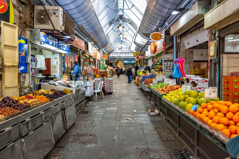 For a guide to the average cost of a trip to Israel, a photo of the old Mahane Yehuda market