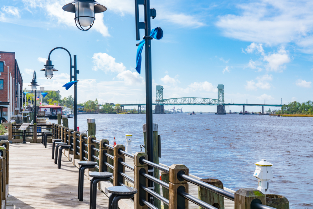 Wilmington, NC walkway by the Cape Fear River for a list of the best East Coast vacations spots
