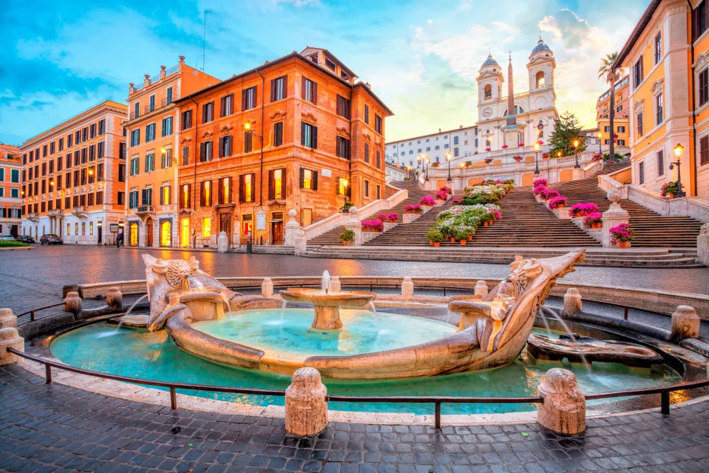 Photo of the Piazza di Spagna in Rome pictured on a clear summer day with no tourists around for a guide to the average cost of a trip to Italy