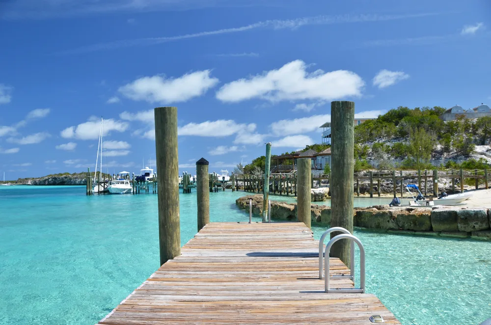 Photo of the elevated wooden dock in the Exumas for a guide to the average price of a Bahamas vacation