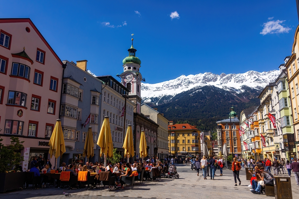 View of a clear day in Innsbruck pictured with a mountain in the background