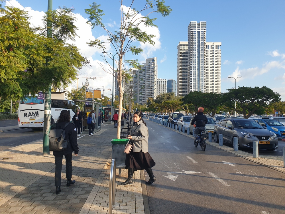 Photo of people outside of a transportation hub in Tel Aviv in December, the overall worst time to visit Tel Aviv