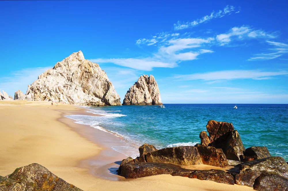Gorgeous rocky shoreline of Cabo pictured on a sunny day