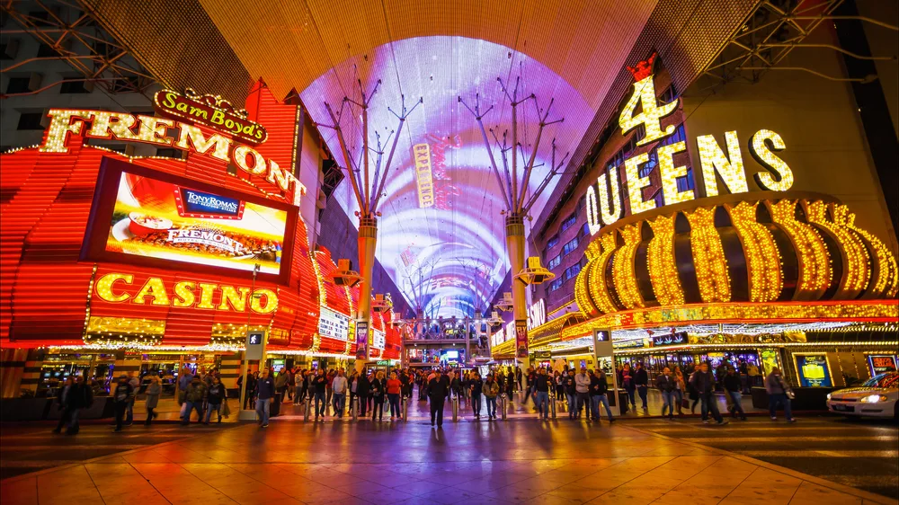 Fremont Street pictured with lots of lights and ads