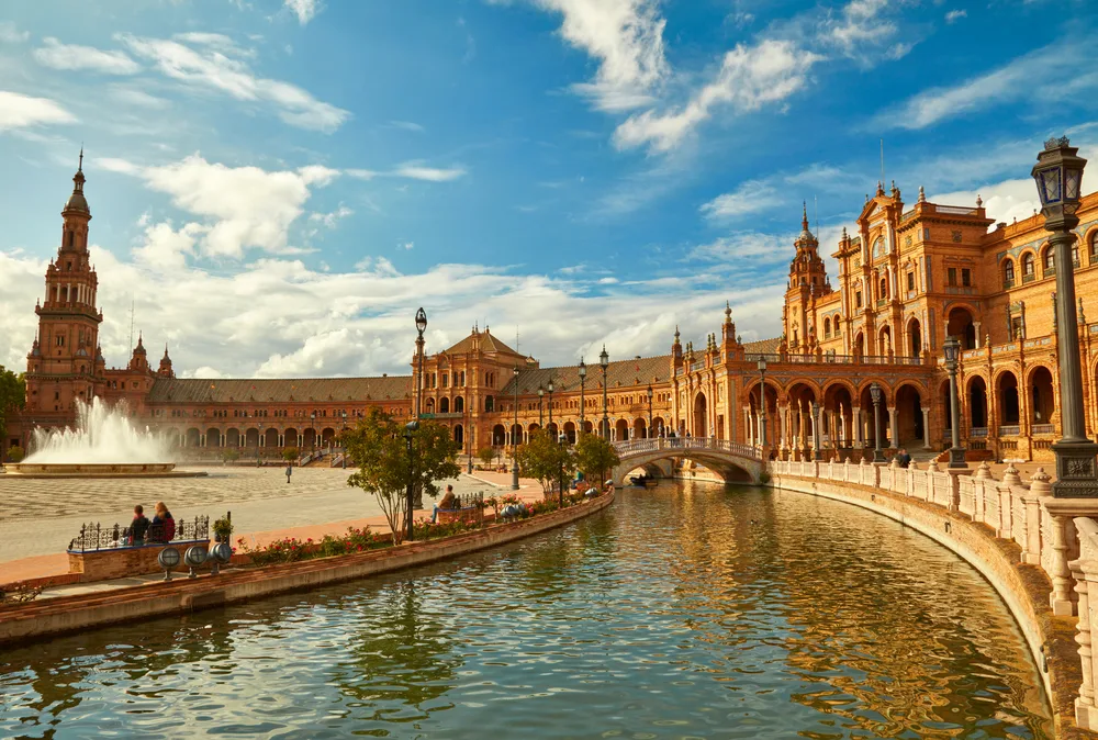 Famous Plaze de Espana in Seville, pictured for a guide titled the average cost to visit Spain cost