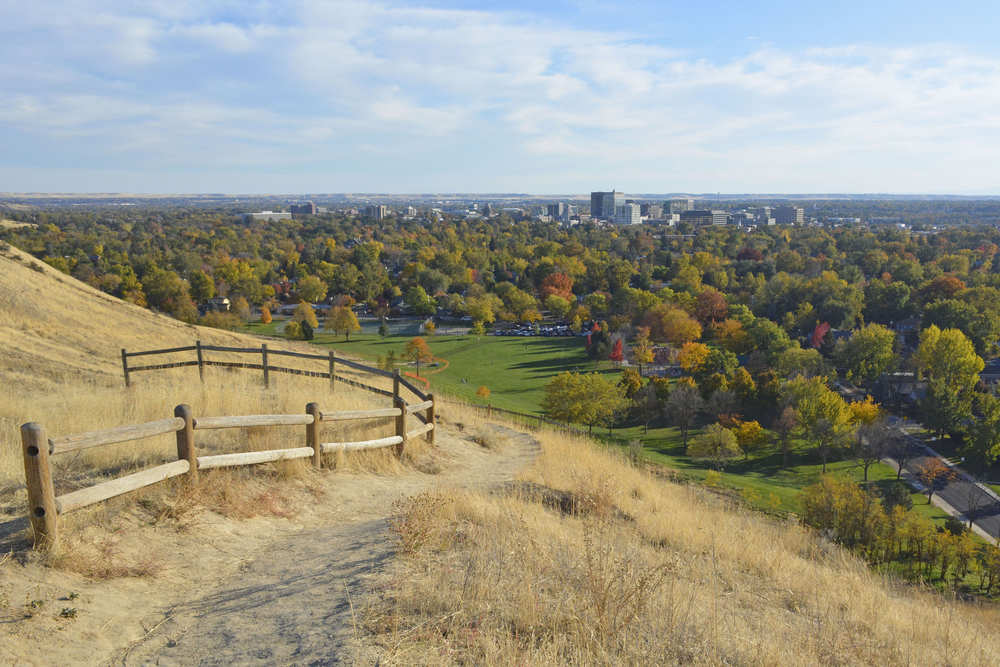 Foothills and a walking path leading up a hill in Boise, pictured during the overall best time to visit