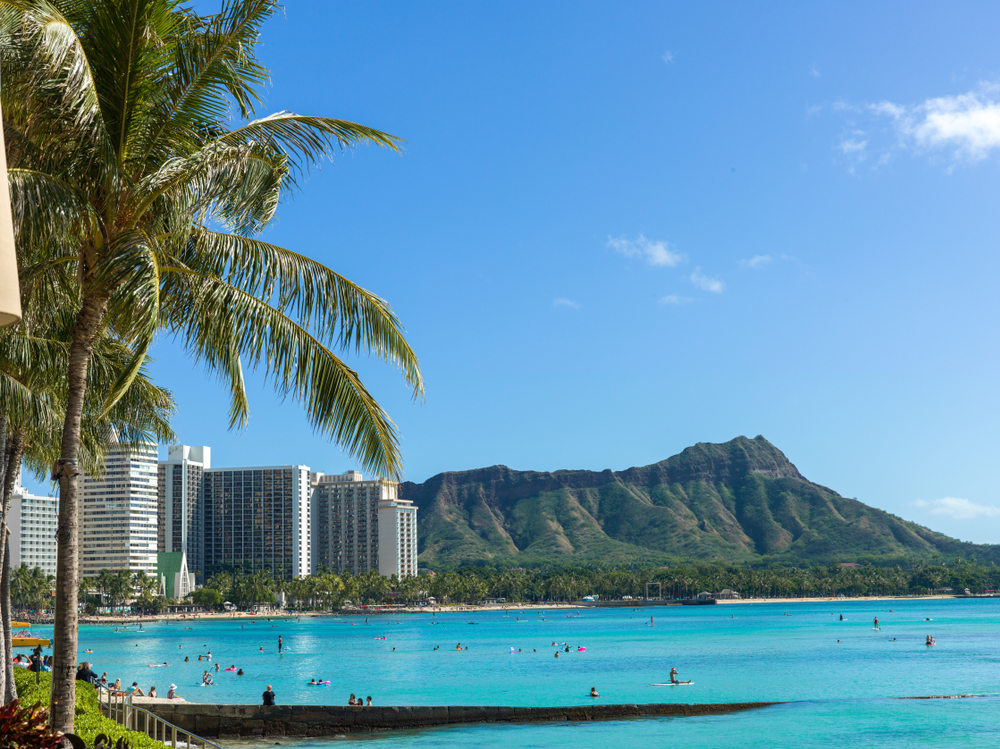 Waikiki Beach and Diamond Head crater in Oahu, Hawaii, one of the best beach vacations you can take in the US