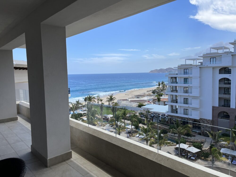 View of the terrace looking toward the ocean with two pillars on the left at Villa La Valencia