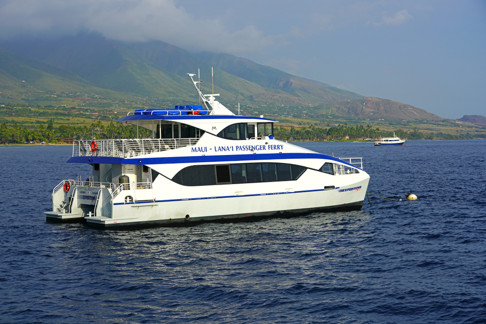 The Maui-Lanai passenger ferry is one method for traveling between islands in Hawaii, shown leaving the Maui port for Lanai on a nice day