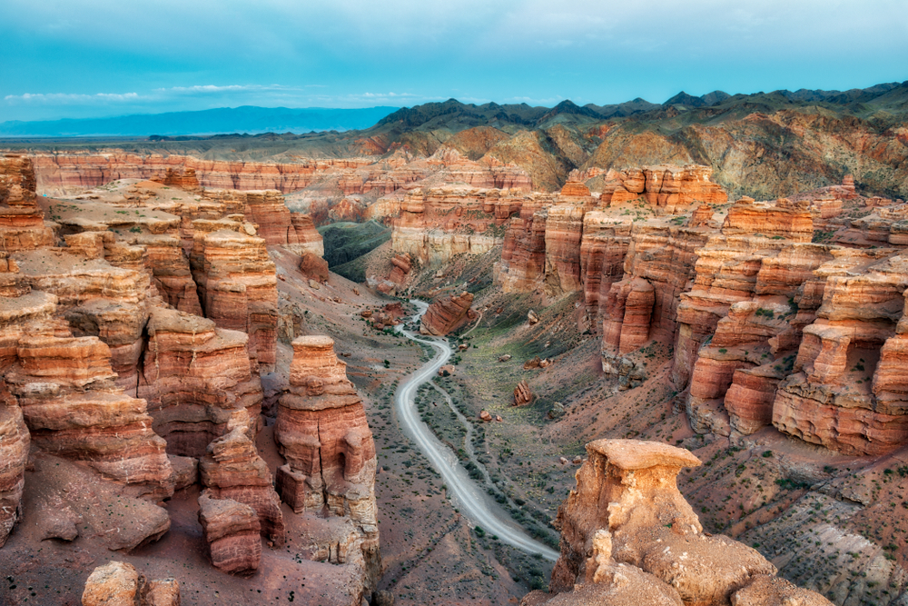 Neat aerial view of the Charyn Canyon in South East Kazakhstan with a road running through the towering cliffs
