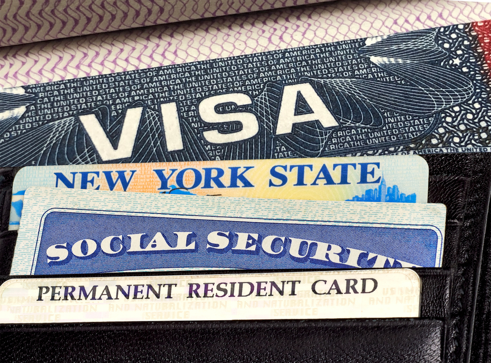 U.S. accepted forms of identification tucked into a wallet for a list of the US domestic travel requirements