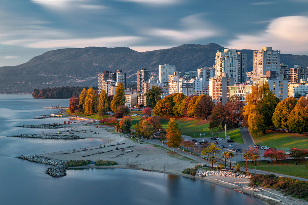 For a guide titled Where to Stay in Vancouver, pictured is an aerial view of the condos towering over the West End in the fall