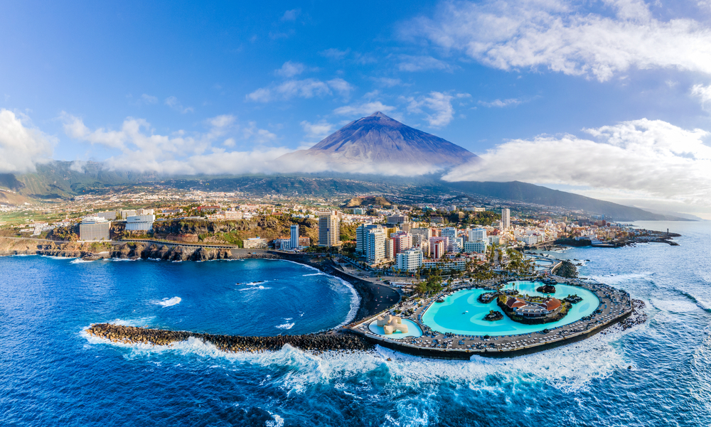 Aerial view of the Puerto de la Cruz area and the Teide volcano in the Canary Islands