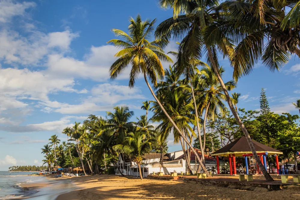 For a guide titled Where to Stay in the Dominican Republic, a photo of a beach in Las Terrenas