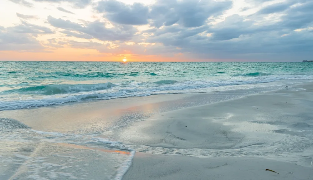Sunset shot of North Lido Beach is near Siesta Key Beach in Sarasota, Florida, ranked as one of the best wedding destinations in the US for beach weddings