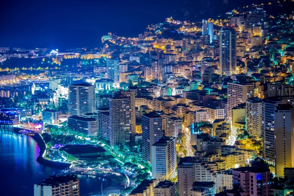 Aerial view of a beautiful city with its city lights and tall building structures. 