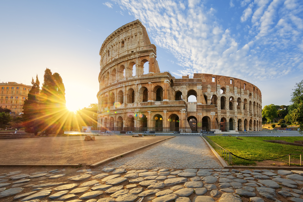 Photo of a picturesque sunrise over the Colosseum in Rome, one of the best tourist destinations in the world