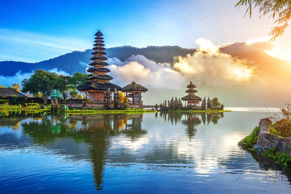 View of Pura Ulun Danu Bratan Temple in Bali, Indonesia reflecting on the water for a list of the best solo travel destinations in the world