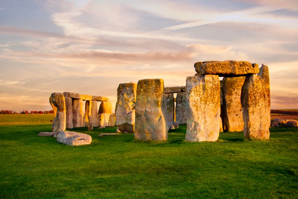 The historical and mysterious Stonehenge during a sunset.