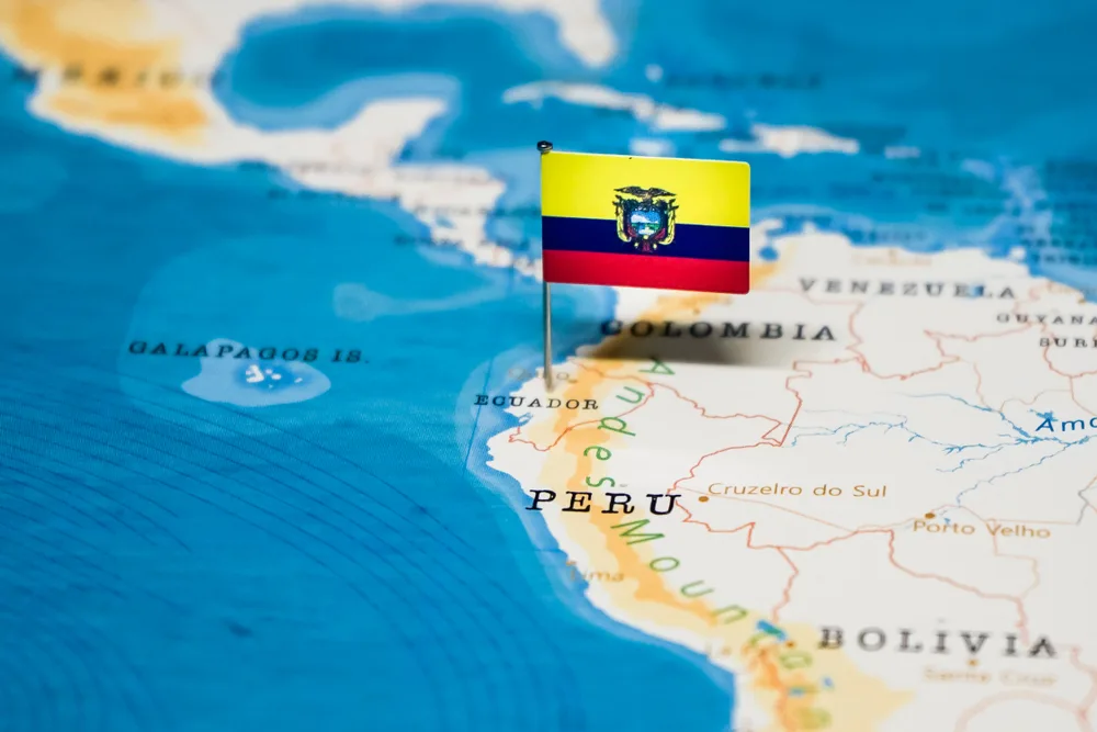 A map with a flag of Ecuador pinned on its location. 
