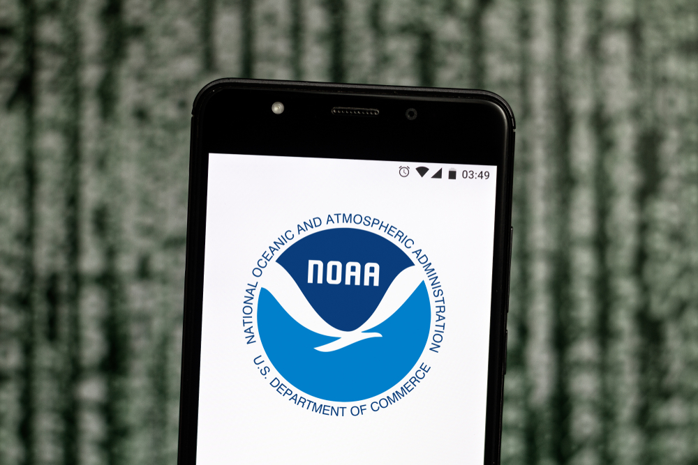 A display on an android phone with the logo of NOAA, National Oceanic and Atmospheric Administration. 