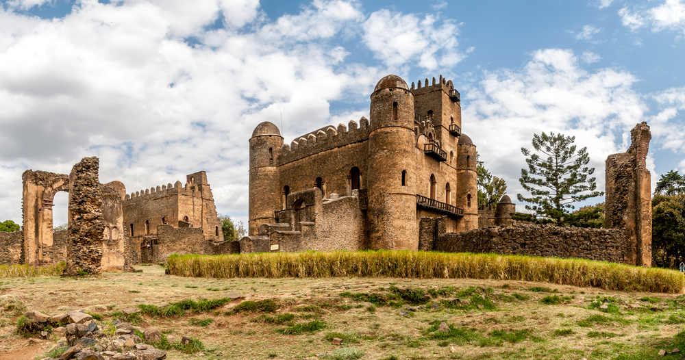 Ruins of an old castle in Gondar, one of our picks on the best areas to stay in Ethiopia, large portions of the castle remains intact, photographed during a cloudy afternoon.