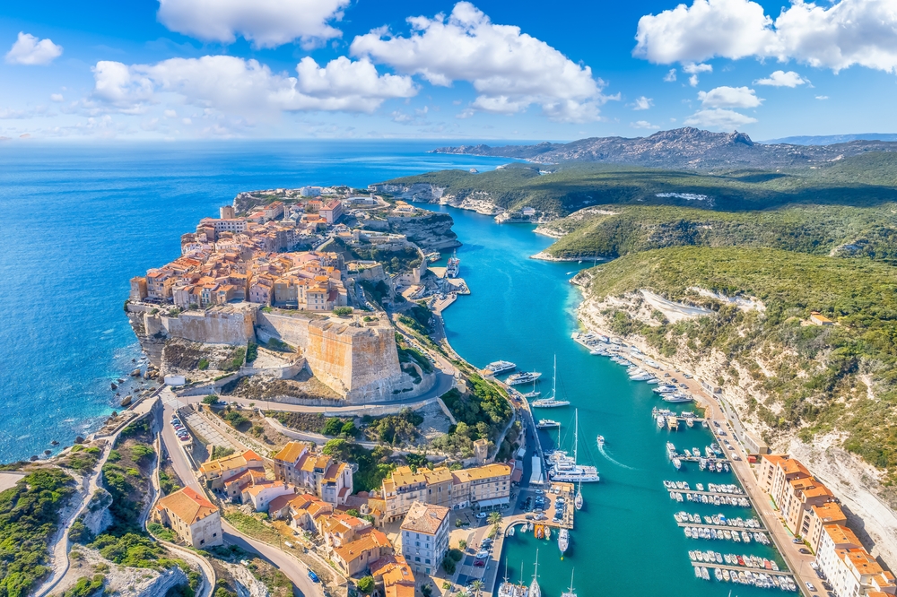 Aerial view of an old town at Corsica, France, a place with scenic locations and one of the best areas to stay in the Mediterranean, the structures are made of bricks and the houses have old design.