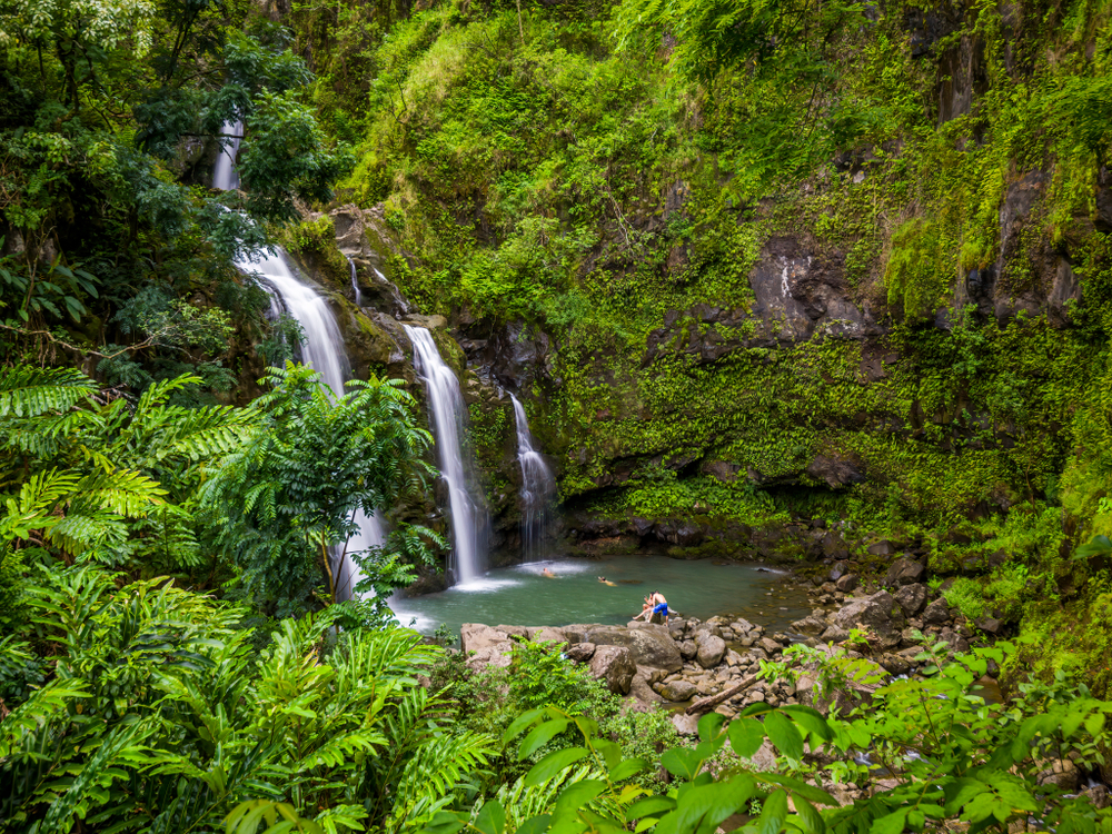 Three Bears Falls on the Road to Hana in Maui surrounded by greenery for a section showing which island to move to in Hawaii for a moving guide
